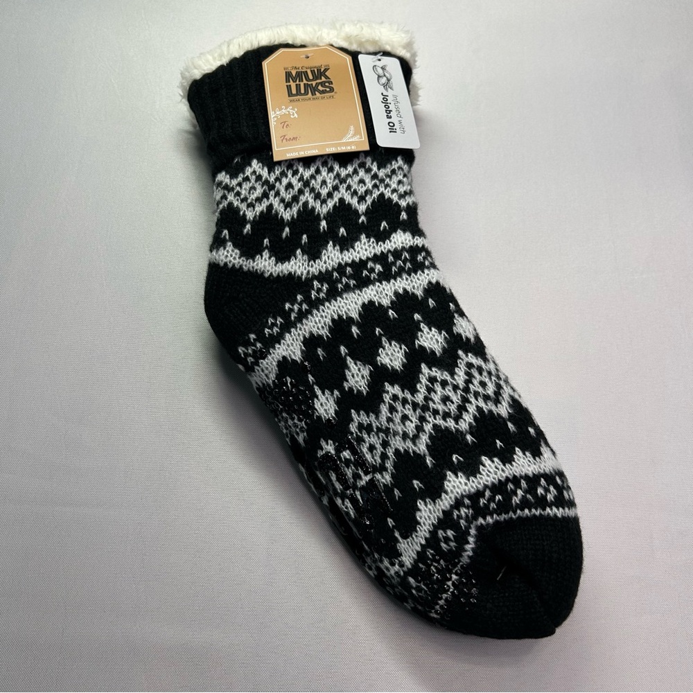 Muk Luks women’s Cabin Socks with non slip grip bottoms black and white print